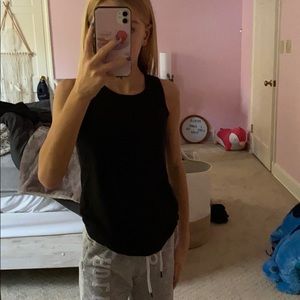 black athletic shirt with knot in back